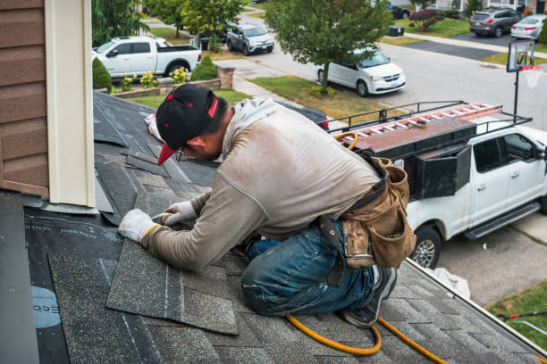 Professional Roofing technician working in Harcourt, IA